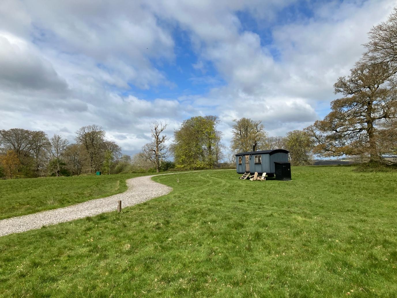 small cabin in field