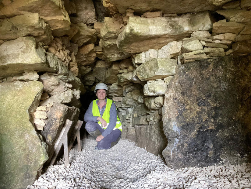 inside cave with hard hat on